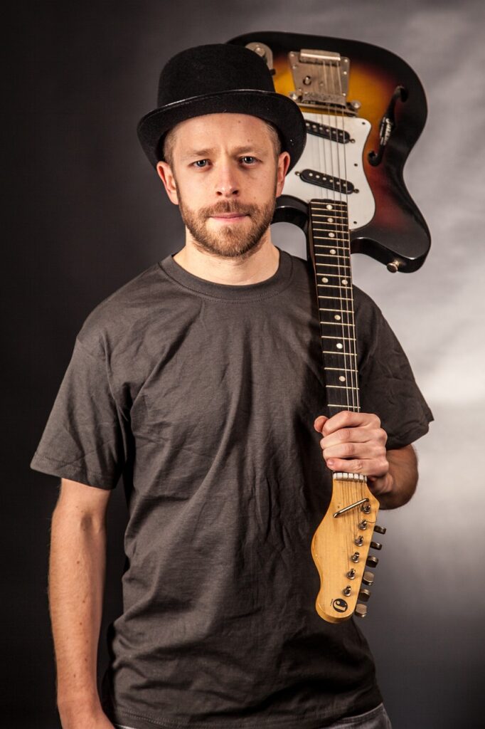 man-guitarist-music-890877 man, guitarist, music-890877.jpg